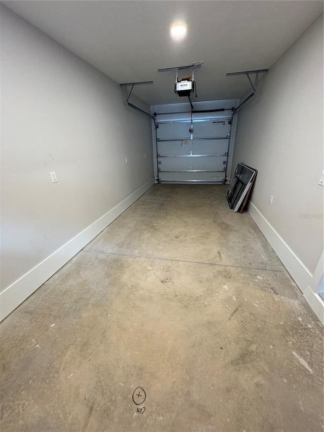 garage featuring a garage door opener