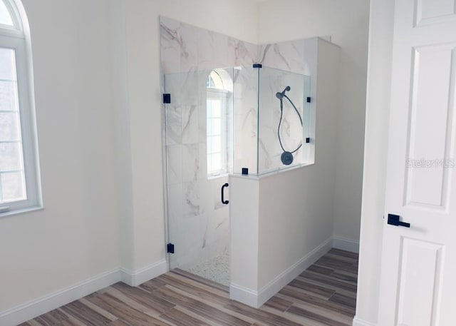 laundry area featuring light wood-type flooring