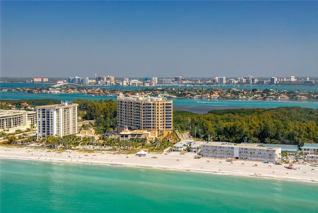 birds eye view of property featuring a water view and a view of the beach