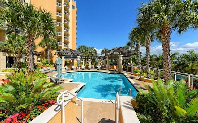 view of swimming pool with a pergola, a gazebo, and a patio area