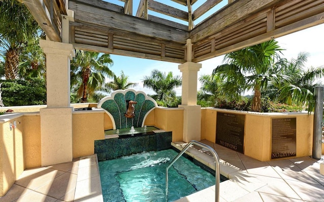 view of pool featuring a community hot tub