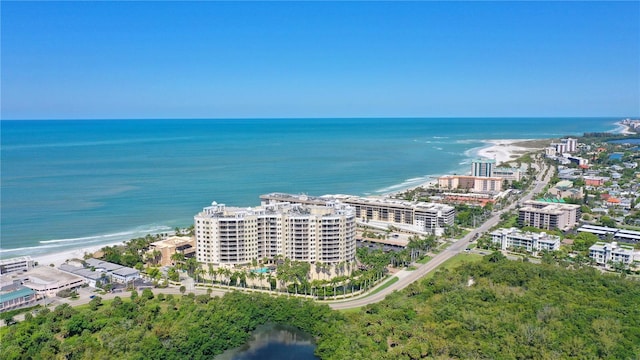 aerial view featuring a water view and a beach view