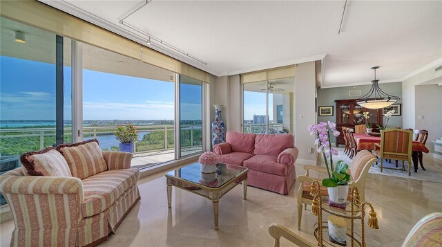 living room with a wall of windows, a water view, and ornamental molding