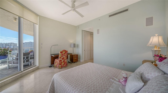 bedroom featuring ceiling fan and access to outside