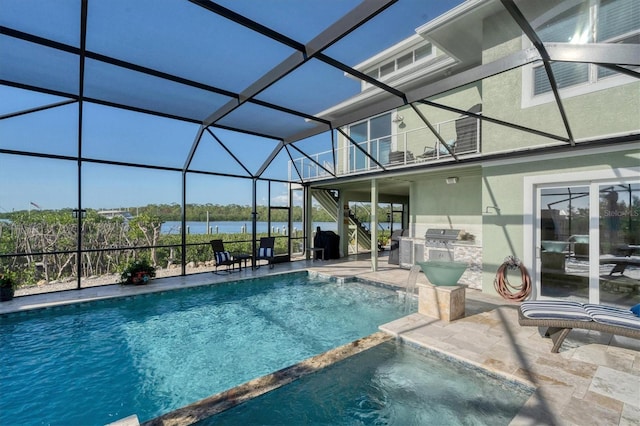 view of swimming pool with grilling area, a patio, a water view, and glass enclosure