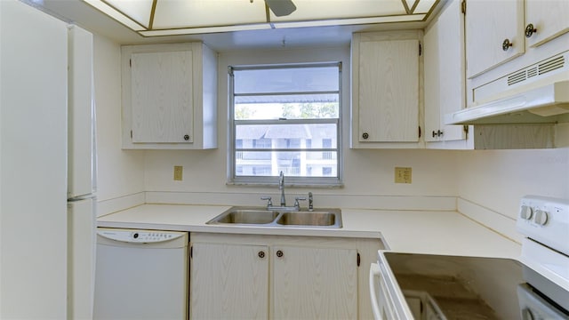 kitchen featuring ceiling fan, white appliances, and sink