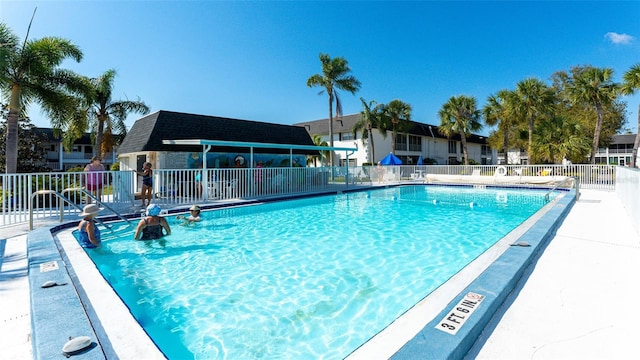 view of swimming pool with a patio area