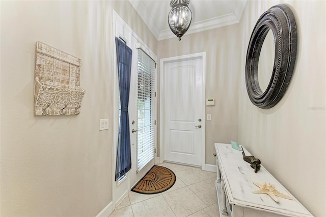 doorway to outside with light tile patterned floors, crown molding, and an inviting chandelier