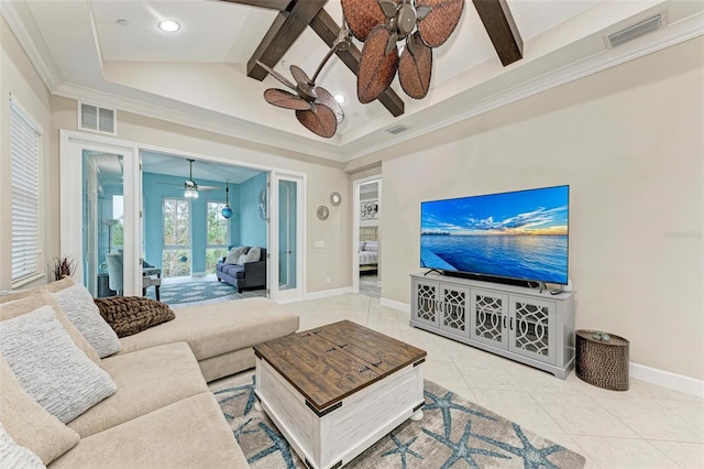 tiled living room featuring beam ceiling, french doors, and high vaulted ceiling