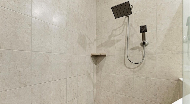 details with a tile shower