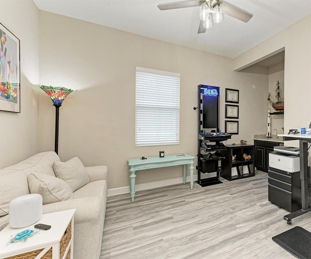 office area featuring ceiling fan and light hardwood / wood-style flooring