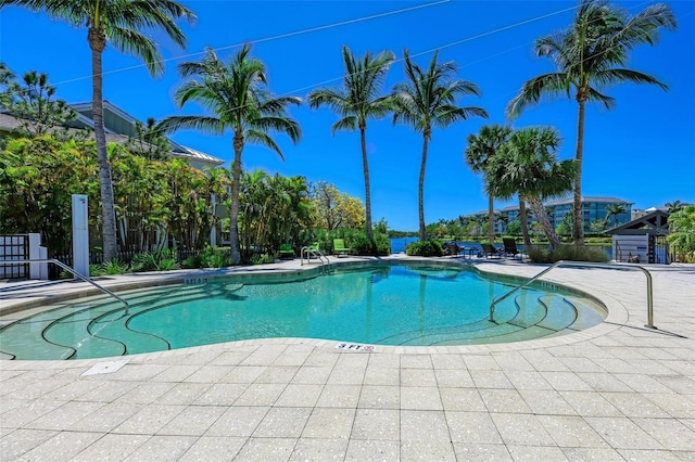 view of swimming pool with a patio area