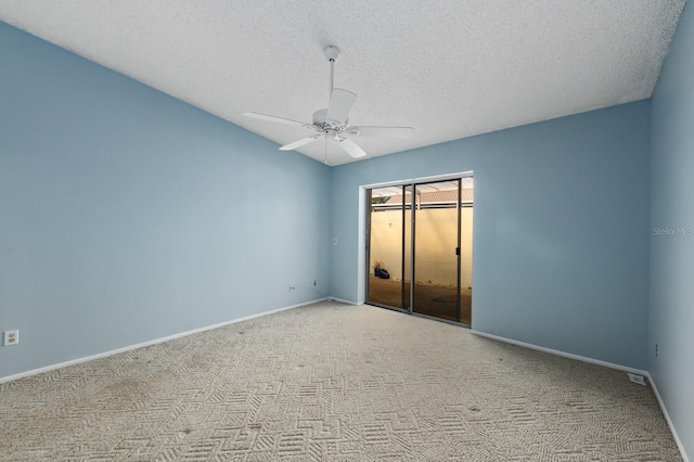 unfurnished bedroom with ceiling fan, a closet, light carpet, and a textured ceiling