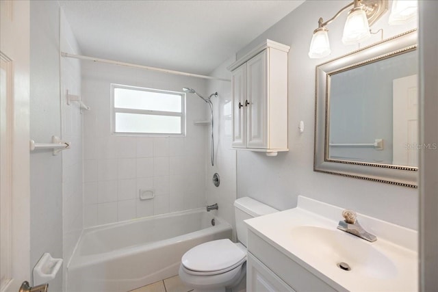 full bathroom with toilet, tiled shower / bath, vanity, and tile patterned floors