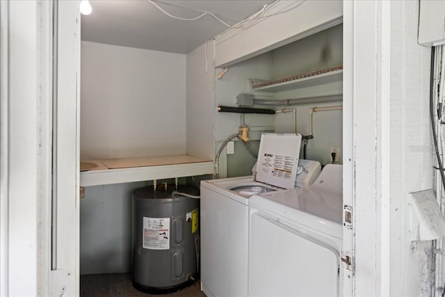 clothes washing area featuring water heater and separate washer and dryer