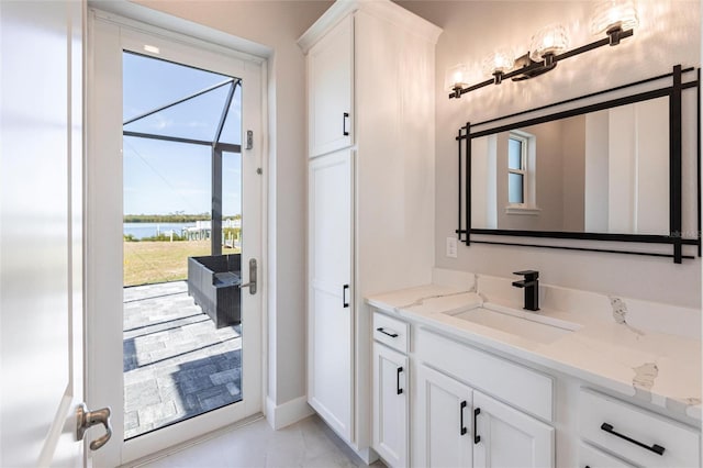 bathroom featuring a water view and vanity