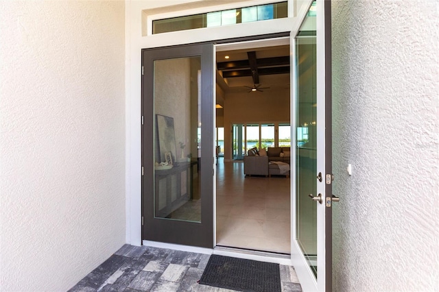 property entrance featuring stucco siding