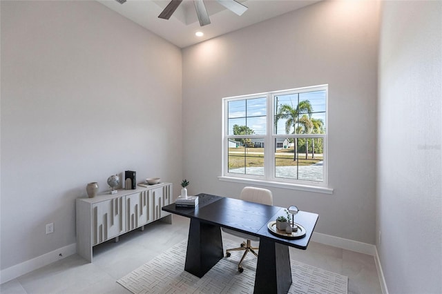 office space with light tile patterned flooring, baseboards, a ceiling fan, and recessed lighting