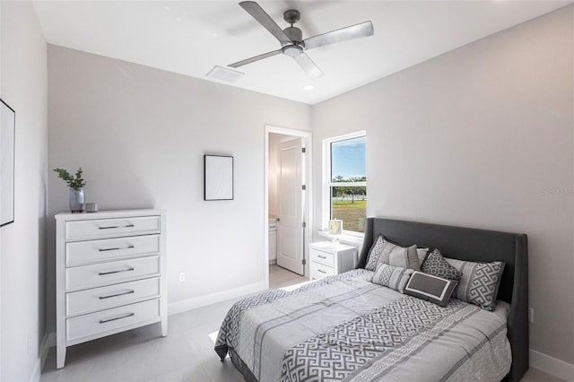 bedroom featuring a ceiling fan, connected bathroom, visible vents, and baseboards