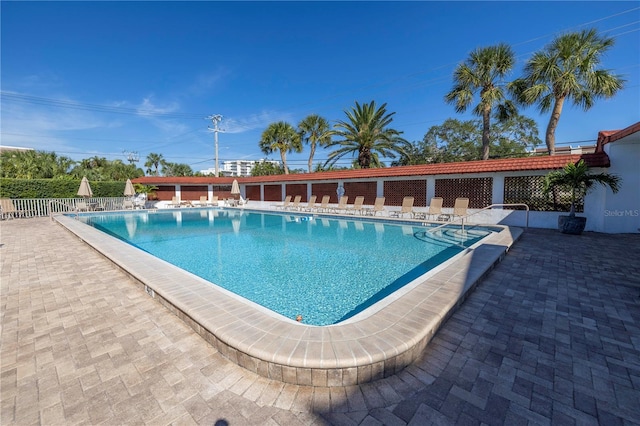 view of swimming pool featuring a patio