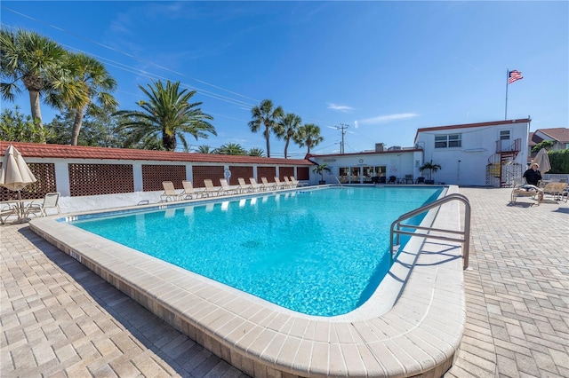 view of pool featuring a patio area