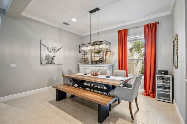 dining area with wine cooler, ornamental molding, and light tile patterned flooring