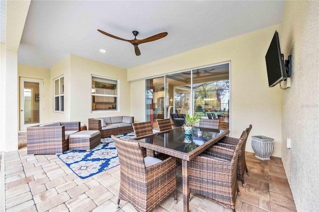 view of patio featuring outdoor lounge area and ceiling fan