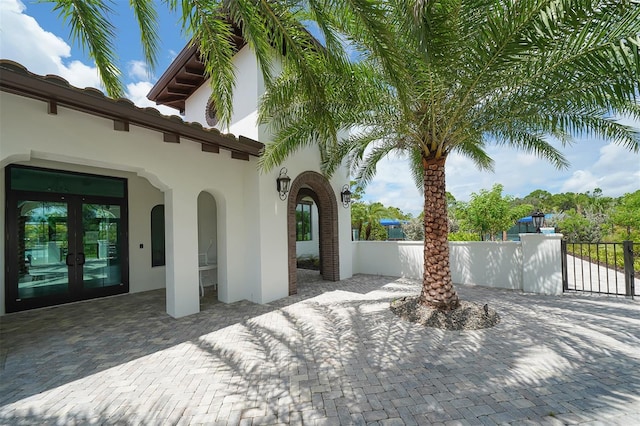 view of patio featuring french doors