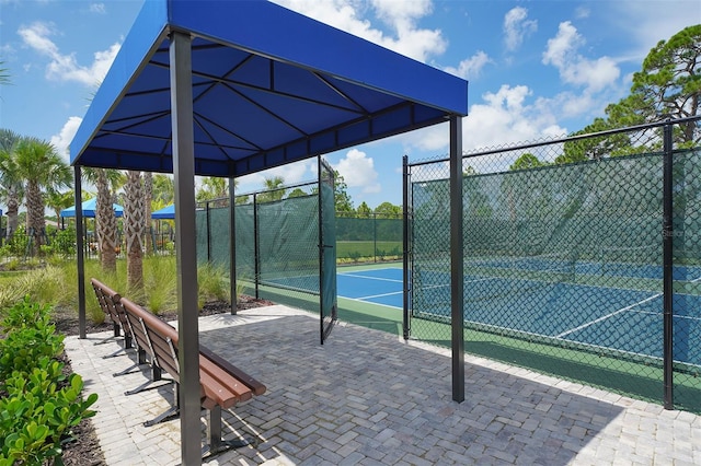 exterior space featuring tennis court