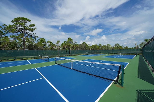 view of tennis court with basketball court