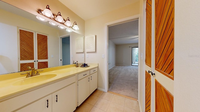 bathroom with vanity and tile patterned flooring