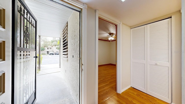 hallway featuring light hardwood / wood-style floors