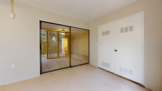 unfurnished bedroom with a closet and carpet