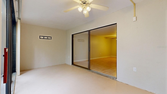 unfurnished bedroom featuring ceiling fan, a closet, and hardwood / wood-style floors