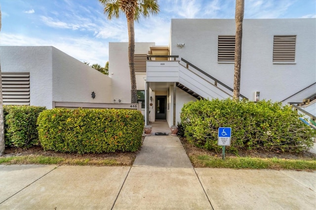 view of front of property featuring stucco siding