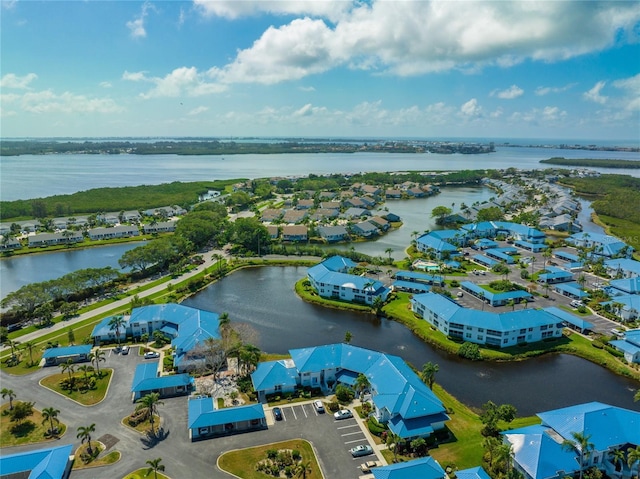 aerial view featuring a water view and a residential view