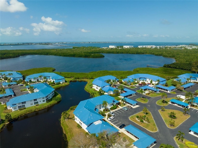 aerial view featuring a water view and a residential view