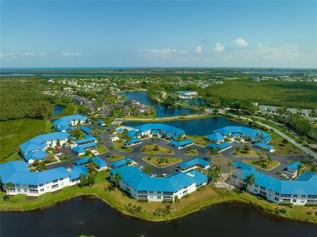 drone / aerial view with a water view