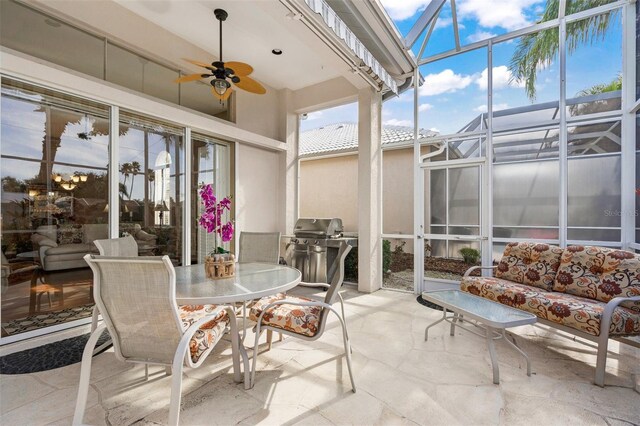 sunroom / solarium with ceiling fan