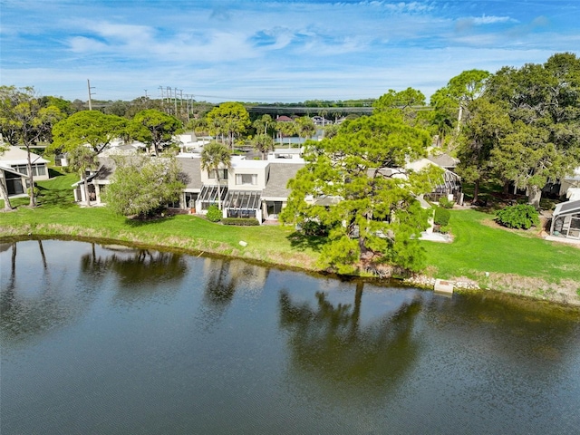 birds eye view of property featuring a water view