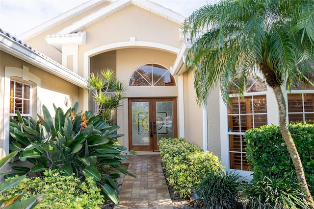 doorway to property featuring french doors