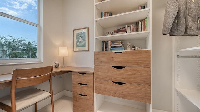 home office featuring tile patterned floors