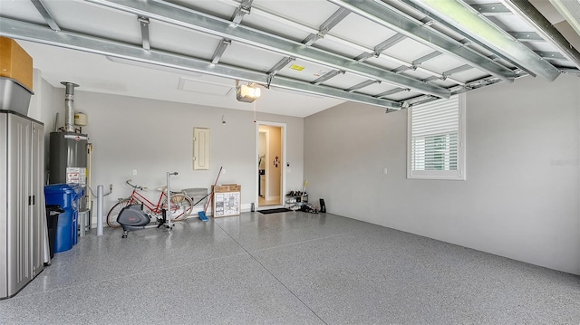 garage with electric panel, a garage door opener, and gas water heater