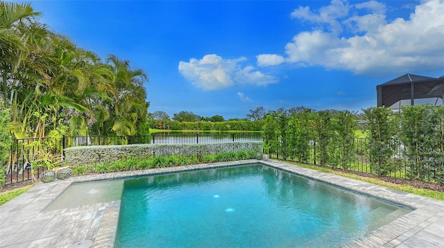 view of swimming pool with a water view