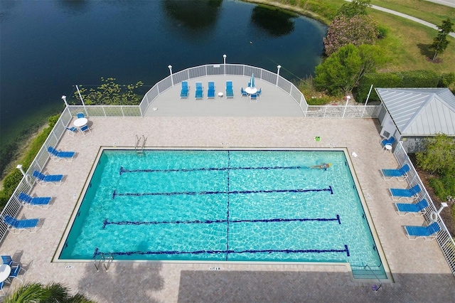 view of pool with a water view