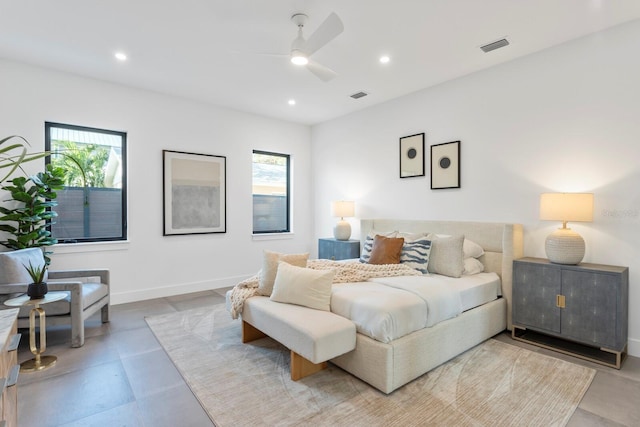 bedroom with multiple windows, visible vents, and recessed lighting