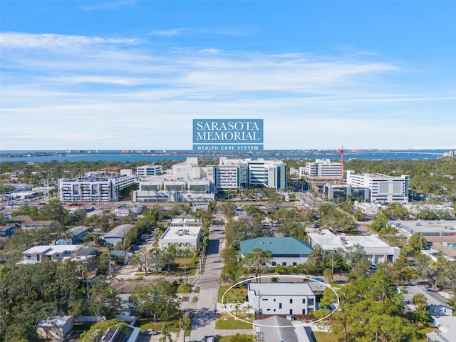 birds eye view of property featuring a city view