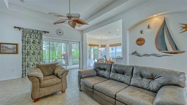 tiled living room with ceiling fan