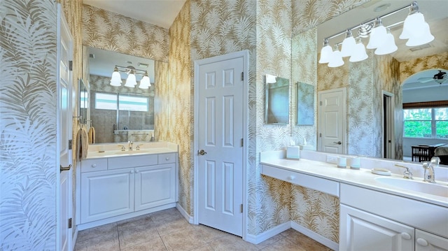 bathroom with tile patterned floors and vanity