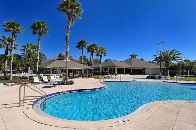 view of pool featuring a patio